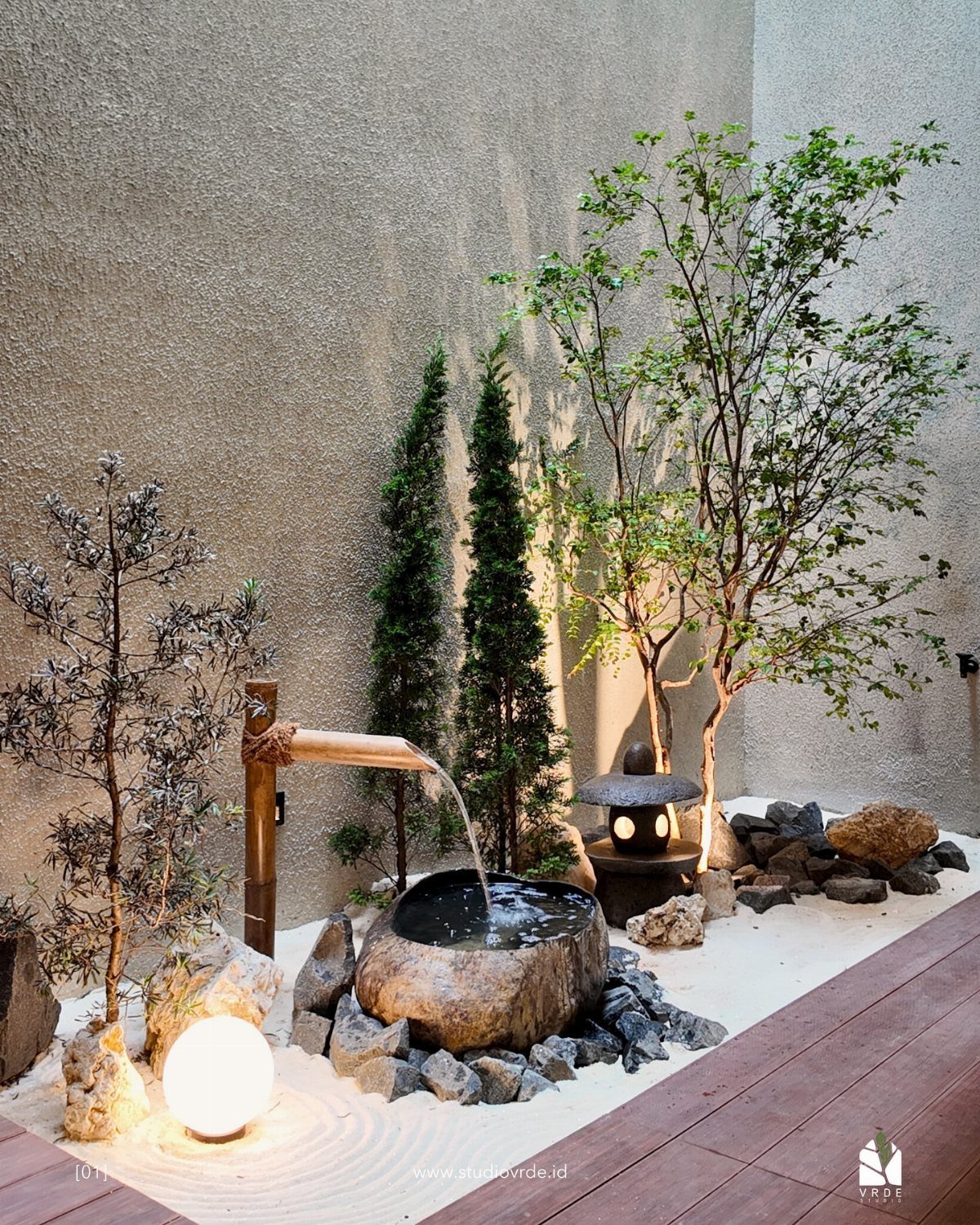 22 Backyard Garden Ideas for Patios, Beds, and Privacy 16 Zen garden with white raked gravel, stone lantern, bamboo water spout, and small trees.