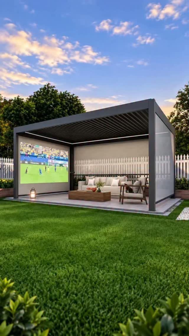 22 Outdoor Backyard Ideas for Dining, Gardens, and Gathering Spaces 17 Modern outdoor lounge structure featuring a large movie screen and comfortable seating on a patio.